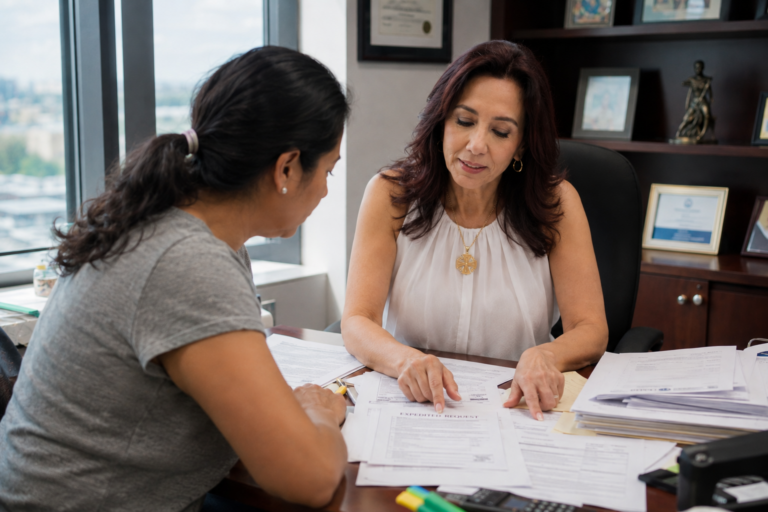 Lawyer speaking with cliente about expedite request
